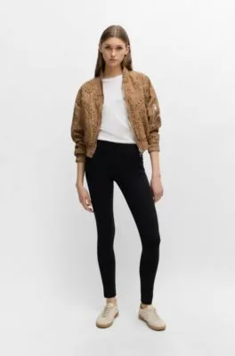 Pantalones extra slim fit en punto con elástico